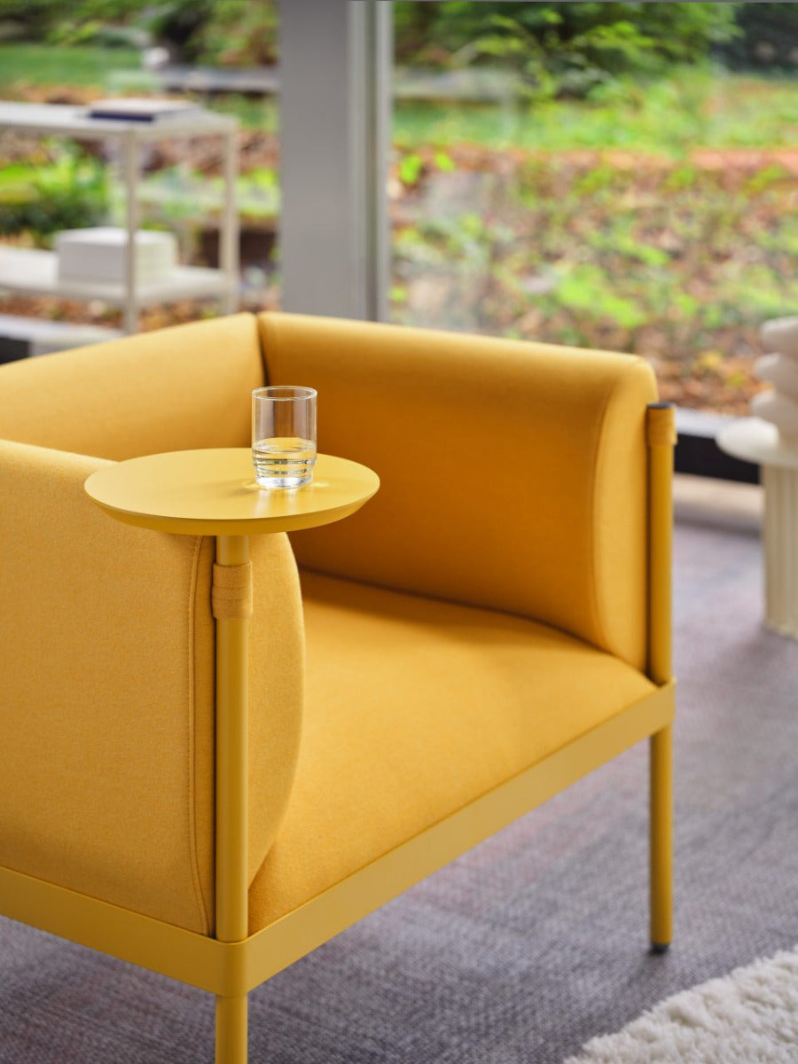 Stilt armchair low backed